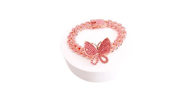 Why you'll love it: Butterfly centerpiece: A symbol of transformation, freedom and new beginnings. Fully iced design: Pink rhinestones cover every link for maximum shine. Rose gold tone: A warm, feminine finish that flatters every skin tone. Cuban link style: A trendy, bold chain that makes a statement on its own or stacked. Secure box clasp: Easy to put on and take off, with added sparkle. A gift they'll treasure: Perfect for birthdays, holidays, best friends or a sweet treat for yourself. A treasure that shines. At AngelBleu Treasures, we believe everyone deserves a little magic. This bracelet is one of those special finds that adds sparkle to every day. Add it to your treasure collection today!